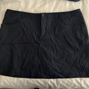 Black skort with front pockets.